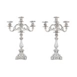 A pair of second grade silver three-armed candelabra, with partly fantasy marks. Holland, 1917. Tota