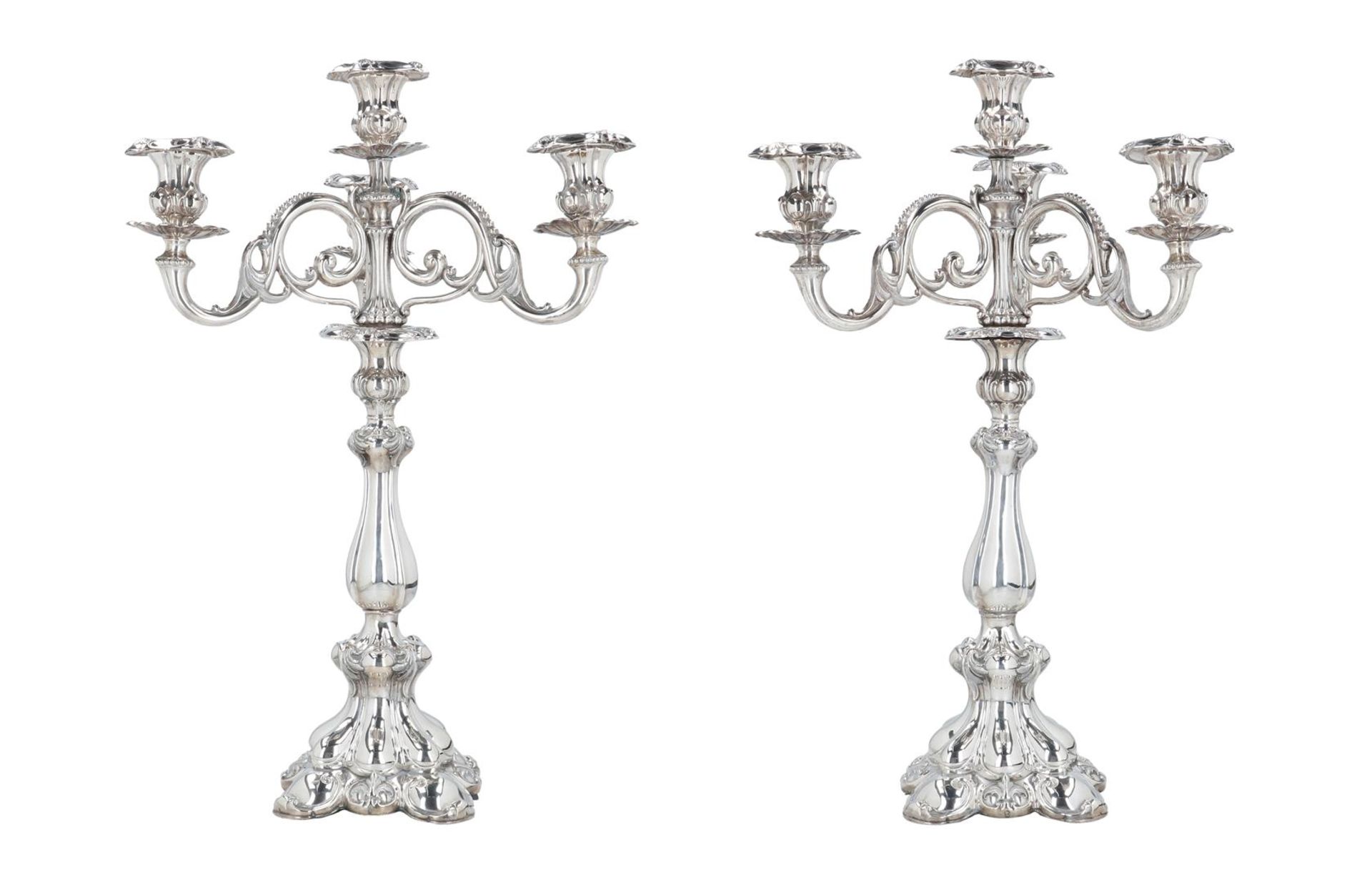 A pair of second grade silver three-armed candelabra, with partly fantasy marks. Holland, 1917. Tota