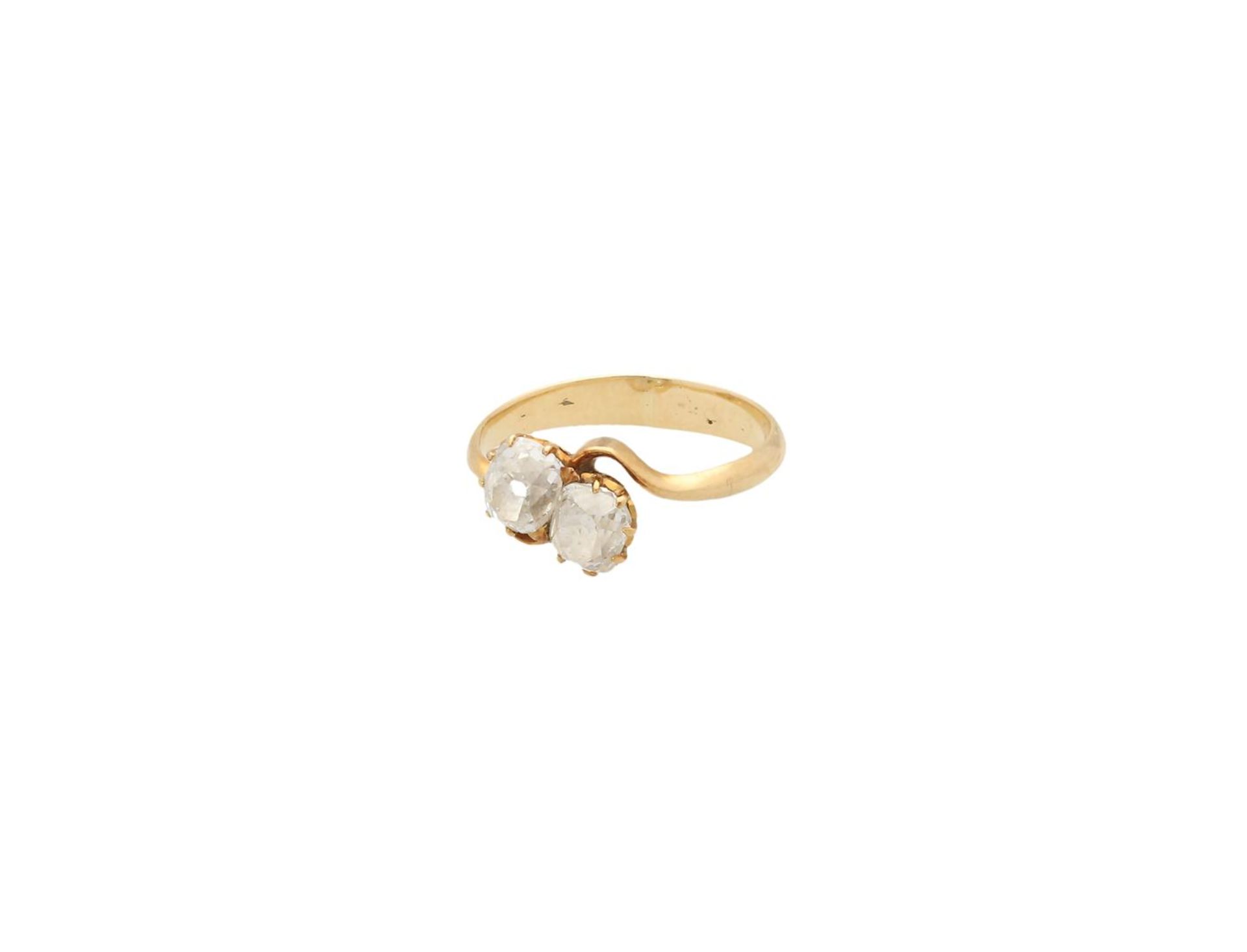 A 14-kt golden ring set with two diamonds of approx. 0.36 ct. each. Size 52 and 5-3/4. Total weight