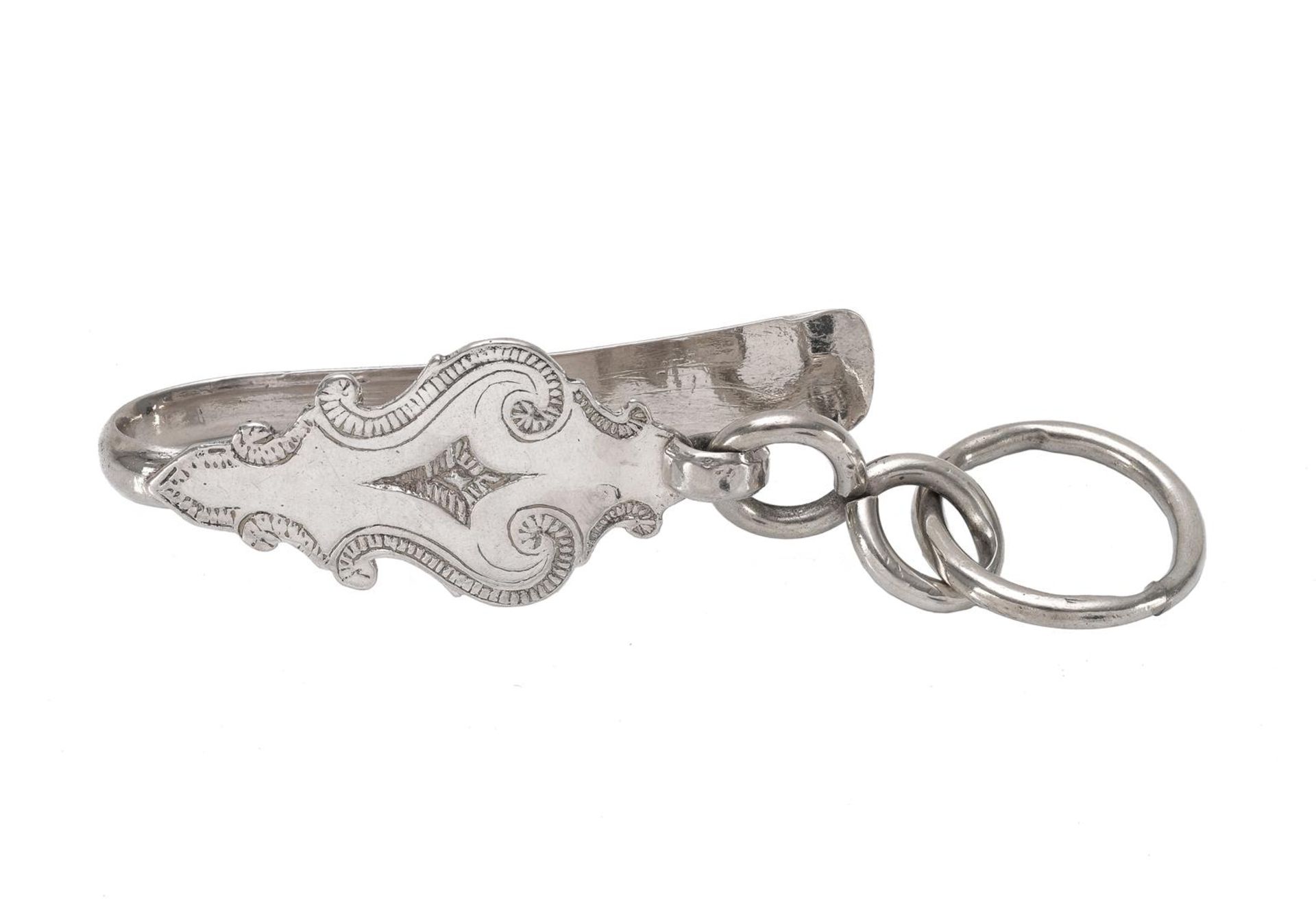 A second grade silver apron hook with engraved decor. Maker's mark Jan van den Berg Sr. Schoonhoven,