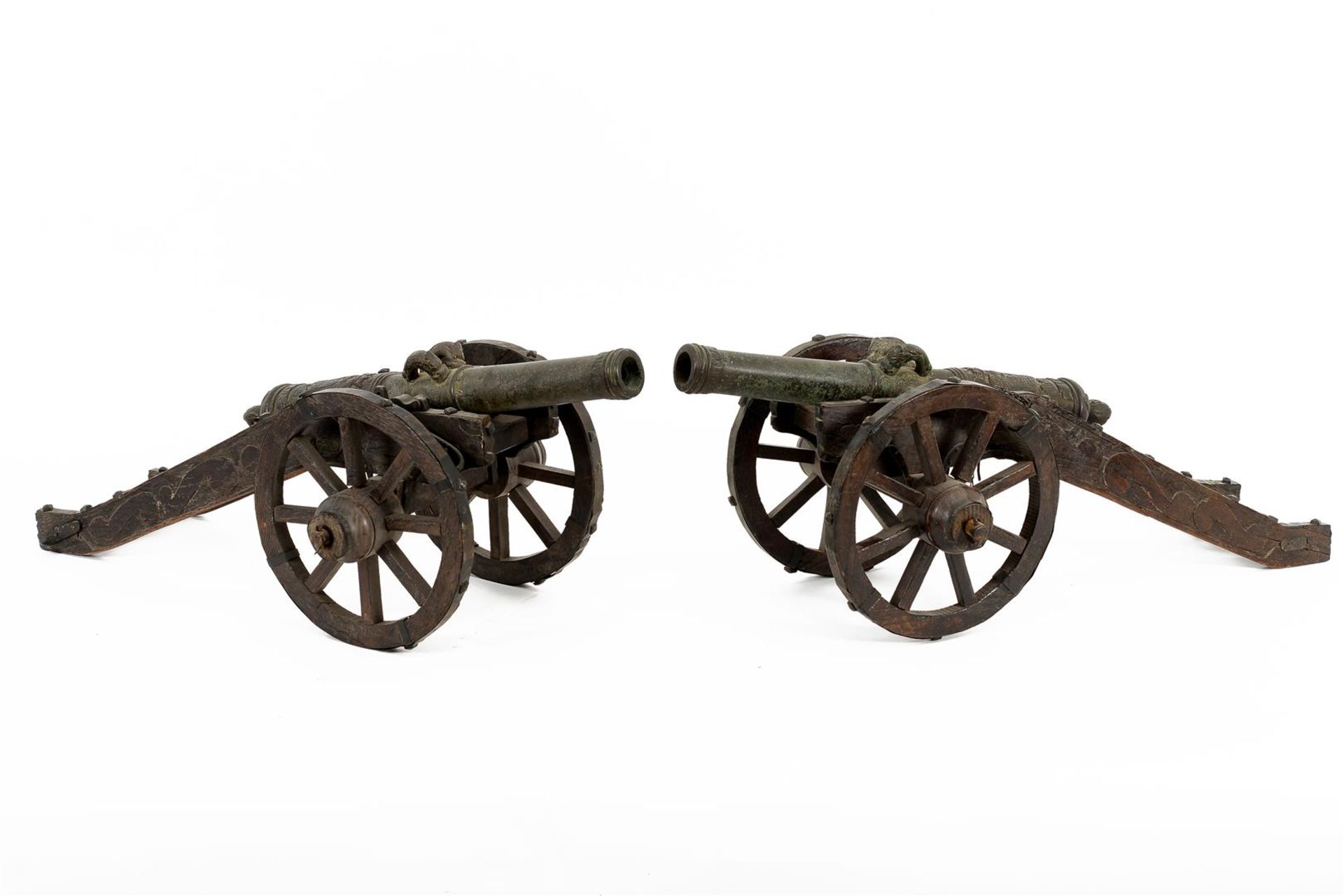 A pair of bronze cannons with coat of arms, on wooden gun carriage. Dated 1630. Holland, 19th centur