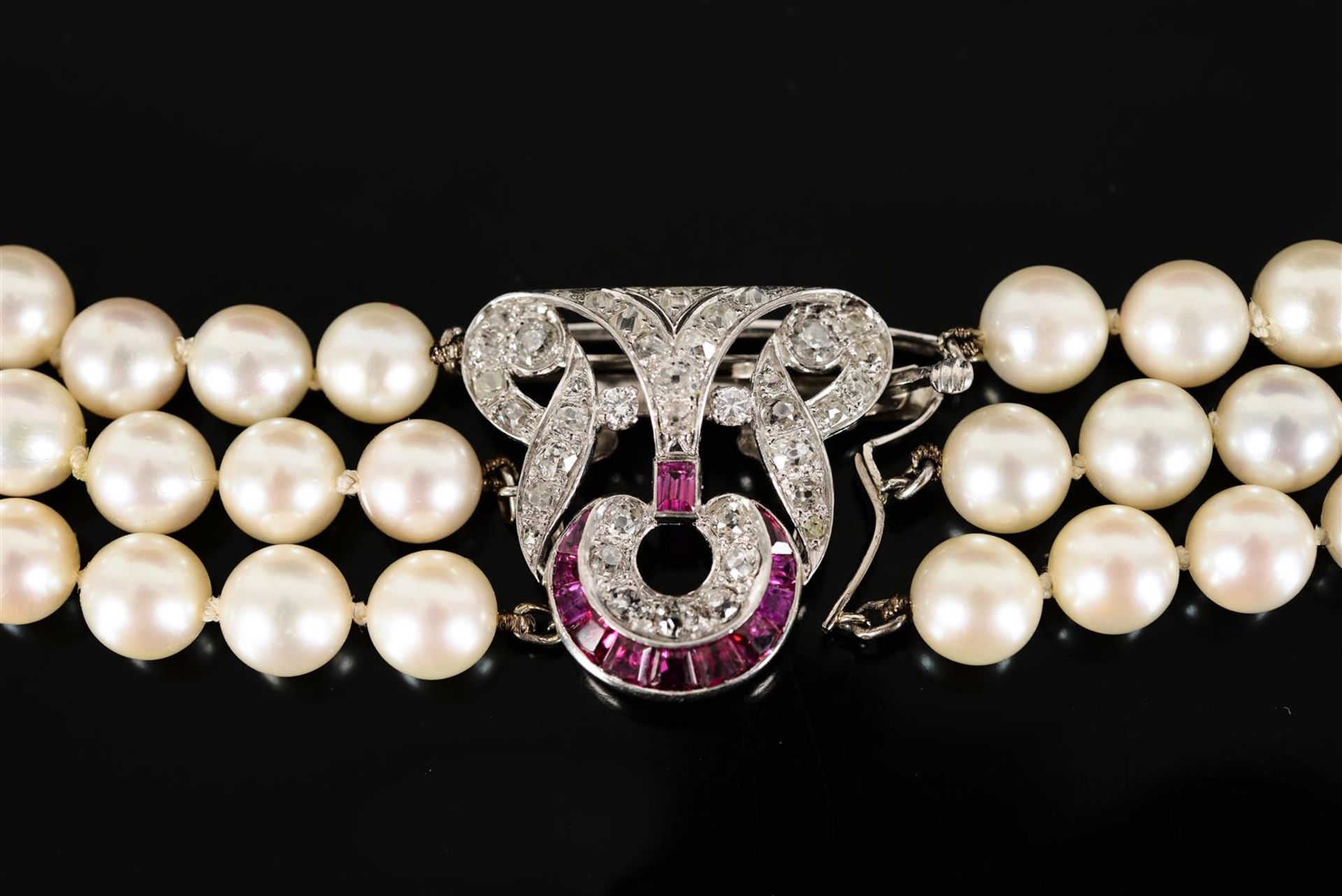 A three-strand cultured pearl necklace with an openwork 14-kt white golden clasp, set with 40 diamon - Image 4 of 6