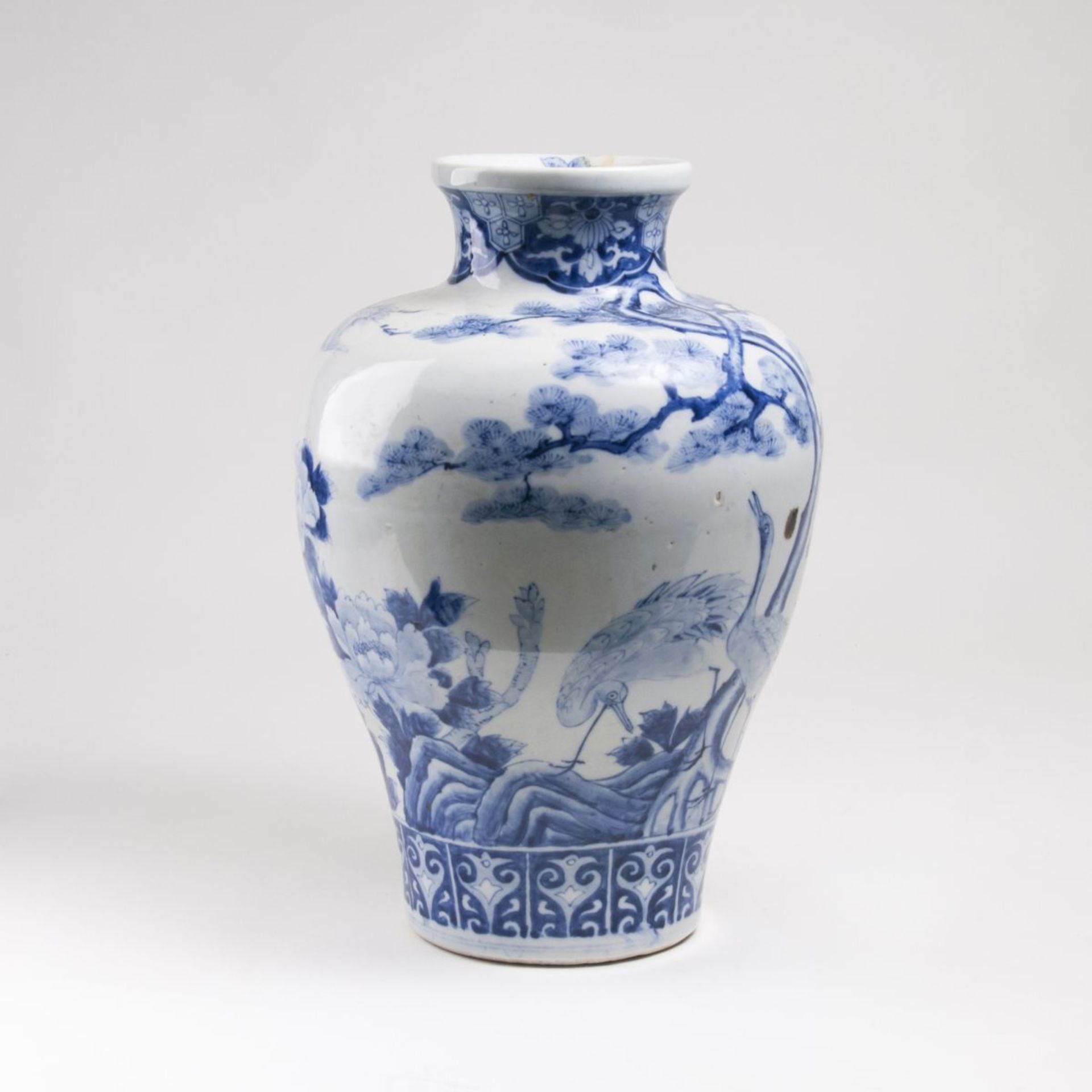 A Blue and White Vase with Cranes