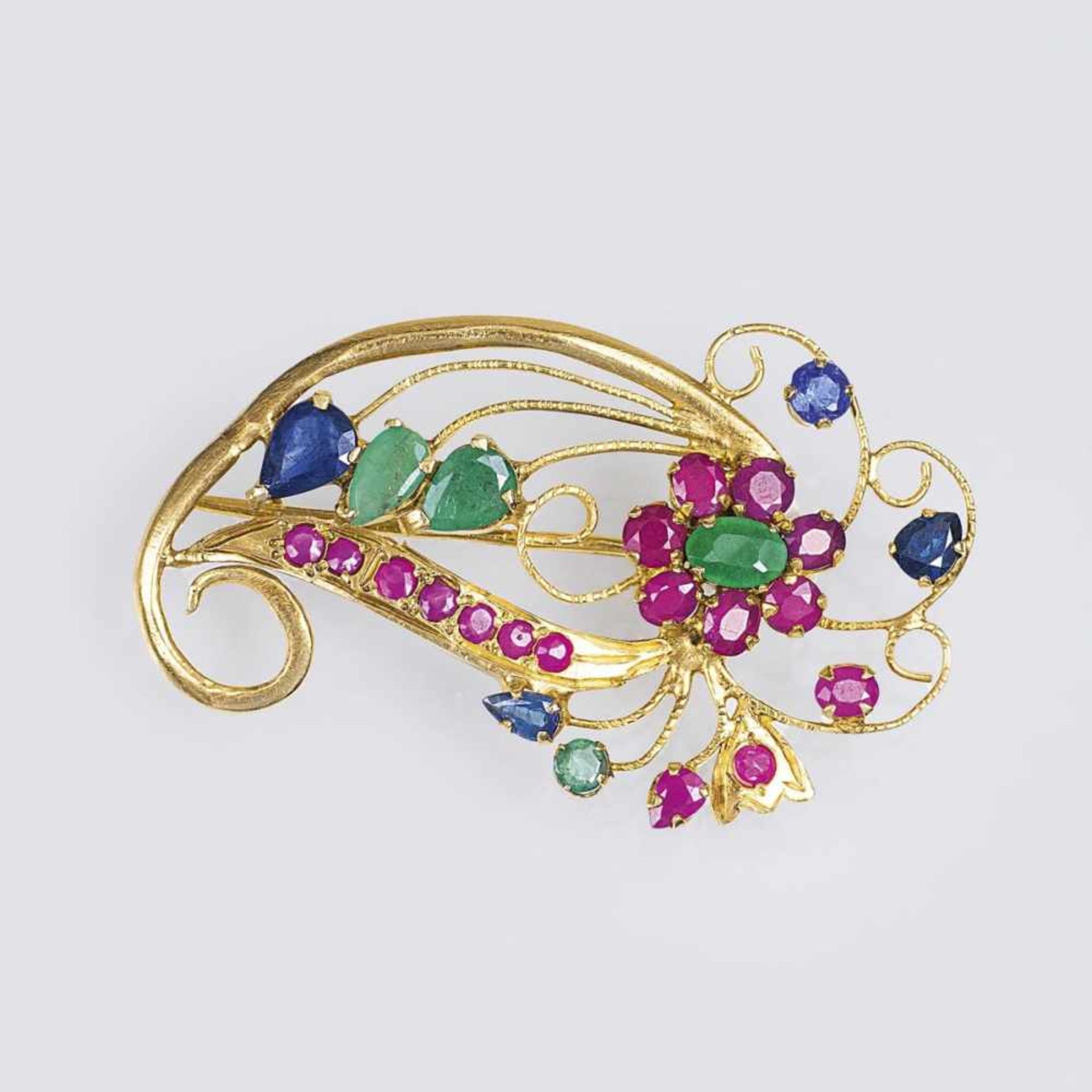 A Vintage Precious Stones Brooch with Rubies and Emeralds14 ct. yellow gold. With 3 sapphires, 17