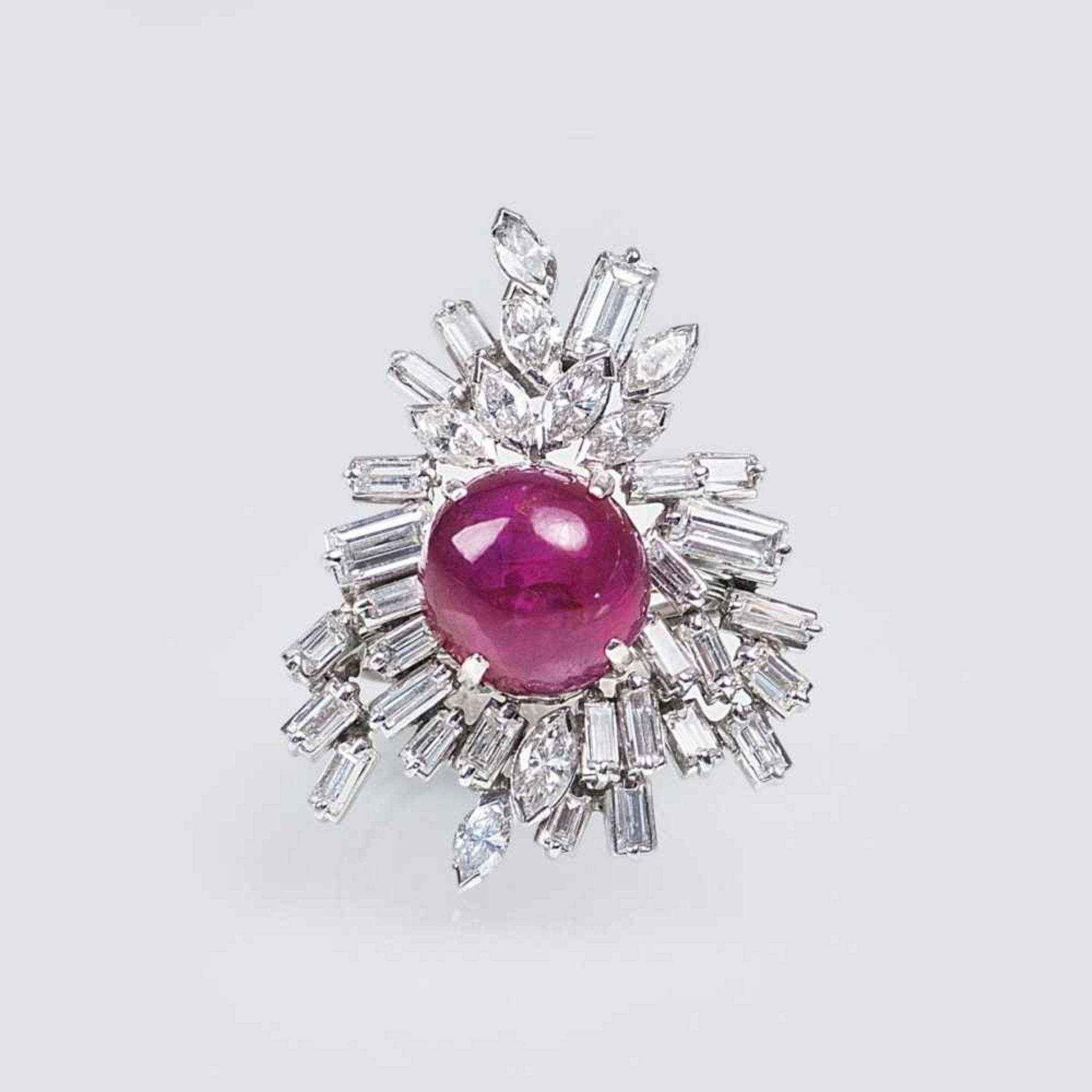 A Vintage Ruby Diamond RingAround 1960. Platinum, marked 'Plat', MM: 'OP'. Large Ringtop with one