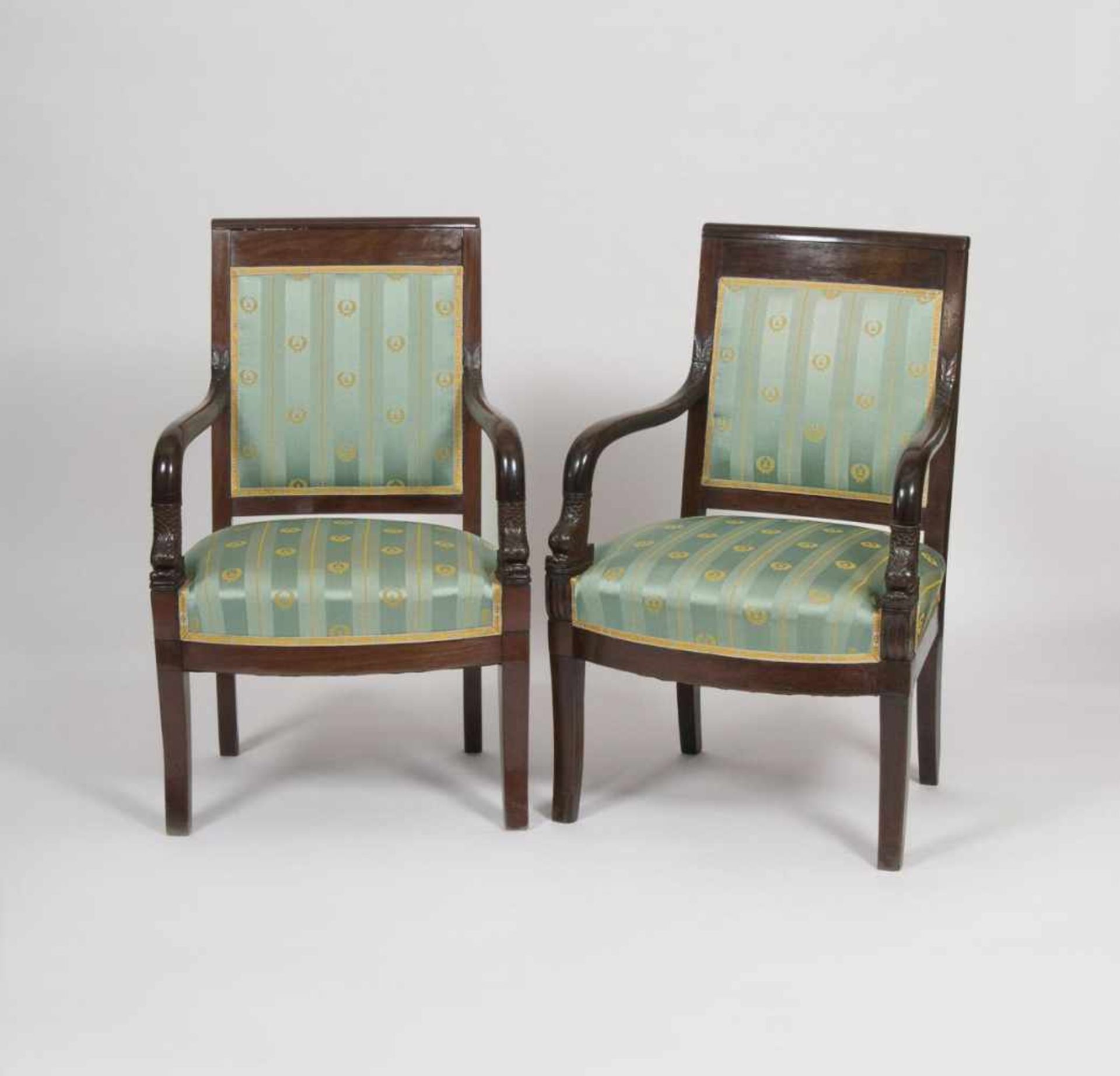 A Pair of Charles X. Armchairs with Dolphin DecorFrance, around 1830. Veneered mahogany. Curved
