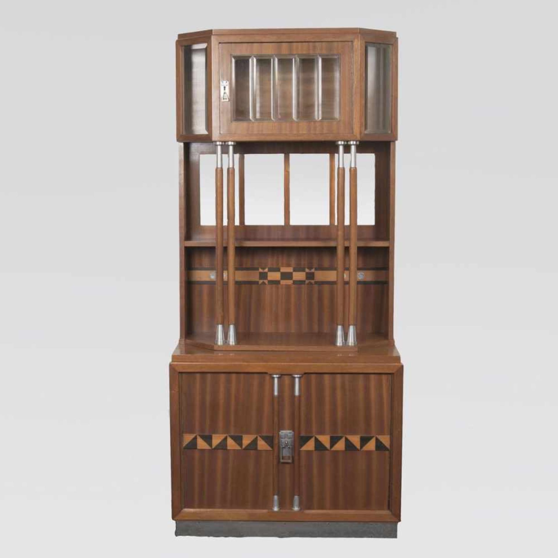 An Art Nouveau CabinetVienna, early 20th cent. Veneered mahogany, faceted glass. Metal fittings.