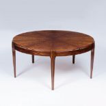 Eleganter Mid-Century Coffee-TableFrankreich, um 1960. Tropisches Edelholz, furniert. Runde