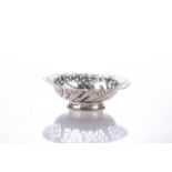 A GEORGE III SILVER BON-BON DISH, LONDON, 1770 Oval, gadrooned wavy rim above a pierced body, on a