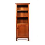A CHERRYWOOD BOOKCASE, MANUFACTURED BY ALAN DE WET OF CAMBIUM DESIGN