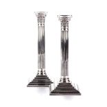 A PAIR OF ELIZABETH II SILVER CANDLESTICKS, W.I. BROADWAY AND CO, BIRMINGHAM, 1988 Modelled as