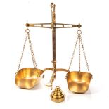 A BRASS GOLD SCALE, DEGRAVE AND CO, LONDON And a Set of Sovereign Weights, W.B. Brown and Co,