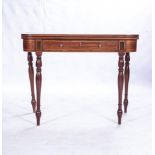 A VICTORIAN MAHOGANY TEA TABLE The hinged rounded rectangular top above a frieze drawer, on ring-