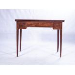 AN EDWARDIAN MAHOGANY TEA TABLE The hinged moulded top above a central frieze drawer flanked by a