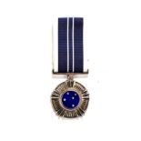 A SOUTH AFRICAN DEFENCE FORCE SOUTHERN CROSS MEDAL Complete with ribbon