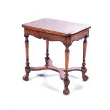 A DUTCH WALNUT LOW TABLE, 19TH CENTURY The shaped crossbanded rectangular top on tapering faceted