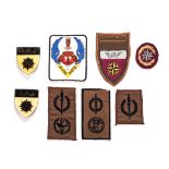 EIGHT REPLICA SOUTH AFRICAN RECONNAISSANCE COMMANDO BADGES Comprising three flashes, three nutria
