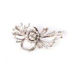 A DIAMOND SPRAY BROOCH Claw-set to the centre with an old-cut diamond weighing approximately 1,80ct,