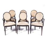 A SET OF SIX DINING CHAIRS, MANUFACTURED BY PIERRE CRONJE Comprising: a pair of carvers and four