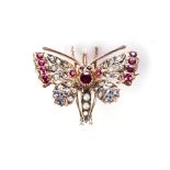 A GEM-SET BUTTERFLY PENDANT/BROOCH Naturalistically modelled, embellished with twenty-four