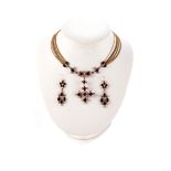 A GEORGIAN GARNET AND SEED PEARL PENDANT CHOKER NECKLACE AND PAIR OF PENDANT EARRINGS The necklace
