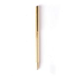 A GOLD-PLATED BALL-POINT PEN, MANUFACTURED BY DUPONT, PARIS Twist mechanism, reeded body with