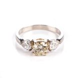 A DIAMOND RING Claw-set to the centre with a round brilliant-cut diamond weighing approximately 0,