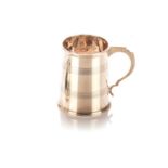 A GEORGE V SILVER TANKARD, MAPPIN AND WEBB, SHEFFIELD, 1932 The tapering body with reeded bands on