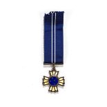 A SOUTH AFRICAN DEFENCE FORCE SOUTHERN CROSS DECORATION Complete with ribbon