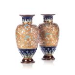 A PAIR OF ROYAL DOULTON LAMBETH AND SLATER VASES, EARLY 1900s Of baluster form, the hand-painted