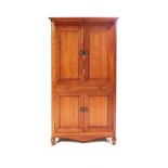 A CHERRYWOOD CUPBOARD, MANUFACTURED BY ALAN DE WET OF CAMBIUM DESIGN