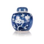 A CHINESE BLUE AND WHITE ‘HAWTHORN-PATTERN’ GINGER JAR AND COVER, QING DYNASTY, LATE 19TH CENTURY