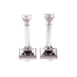 A PAIR OF SILVER CANDLESTICKS, SHEFFIELD Modelled as Corinthian columns, each gadrooned base