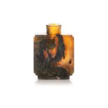 A CHINESE MOSS-AGATE SNUFF BOTTLE, QING DYNASTY, 19TH CENTURY Raised on an oval foot, the