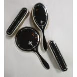 A TORTOISESHELL AND SILVER DRESSING TABLE SET NOT SUITABLE FOR EXPORTComprising: a hairbrush, mirror