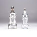 A VICTORIAN GLASS AND SILVER MOUNTED DECANTER, EARLY 20TH CENTURY The shoulder of the shaped