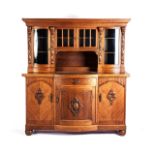 A MAHOGANY CONTINENTAL SIDEBOARD, 20TH CENTURY With a moulded cornice above decorated columns