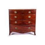 A MAHOGANY CHEST OF DRAWERS With string inlay, four full drawers, oval pressed brass handles,