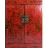 A RED LACQUER SHANXI CUPBOARD, 19TH CENTURY With hand painted countryside scenery and lotus flowers,