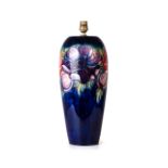 A MOORCROFT 'ANEMONE' PATTERN LAMP BASE The elongated ovoid form tube-lined and painted to the