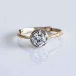 A DIAMOND DRESS RING Claw-set to the centre with a rose-cut diamond weighing approximately 0,