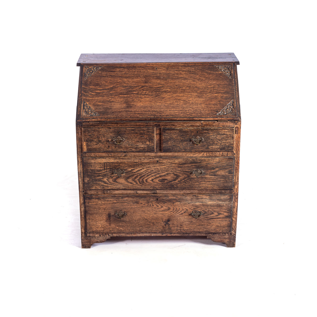 AN OAK BUREAU, 19TH CENTURY With a carved fall front, revealing a fitted interior supported by - Image 2 of 2