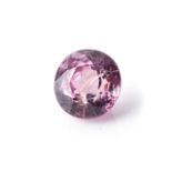 AN UNMOUNTED SPINEL A 3,09ct round, brilliant-cut spinel