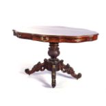 A VICTORIAN ROCOCO-STYLE CENTRE TABLE The oval top waves in a scalloped edging with two drawers on