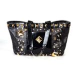 A MULBERRY HANDBAG For Giles Deacon, circa 2008, black leather with rolled gold details, with