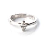 A DIAMOND SOLITAIRE RING Claw-set to the centre with a marquise-cut diamond, weighing 0,31cts,