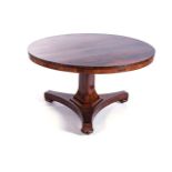 A VICTORIAN MAHOGANY CENTRE TABLE With circular plain top, on a hexagonal pillar, supported by a