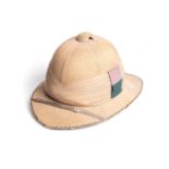 WWI WOLSELY PATTERN PITH HELMET Worn by South African troops in German East Africa on campaign,