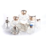 VARIOUS SILVER PERFUME BOTTLES Glass with sterling silver caps (8)
