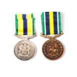 DE WET DECORATION & MEDAL Decoration number 33, silver marked, Medal number 613, both full size